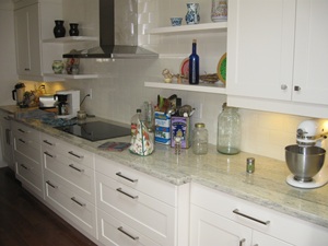 LED under cabinet lights brighten our new granite countertops